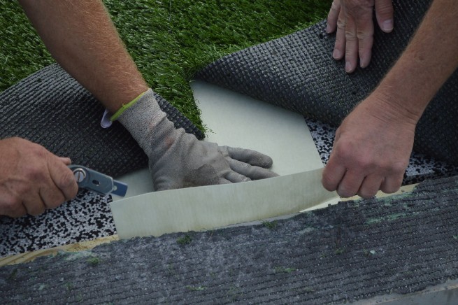Edmonton artificial turf installation - cushion pad installation